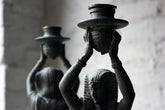 A Good Pair of c.1900 Bronzed Spelter Egyptian Revival Figural Candlesticks