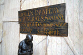 A Fragmentary Early-Victorian Painted Pine Drapers & Undertakers Sign c.1850-60