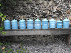 A Good Set of Nine Vintage Enamel Kitchen Storage Canisters