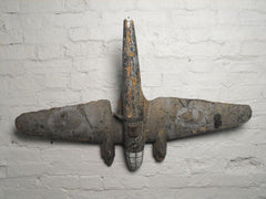 A Delightful Early 20thC Carved Wooden Polychrome Fairground Luftwaffe HE111 Aeroplane From a Round Spinner Stall