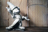 A 20thC Stone Figure of Mickey Mouse; The Sorcerer's Apprentice in Fantasia