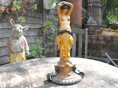 A Beautiful Painted Cast Iron Figural Door Stop of a Scantily Dressed Lady