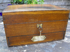 A Good 19thC British Oak Campaign Apothecary Chest to Include Sixty-Seven Bottles