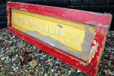 A Fantastic Mid 20thC Hand Painted "Its Thrilling" Fairground Panel Sign