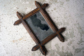 A c.1900 Stained Pine Tramp Art Wall Mirror