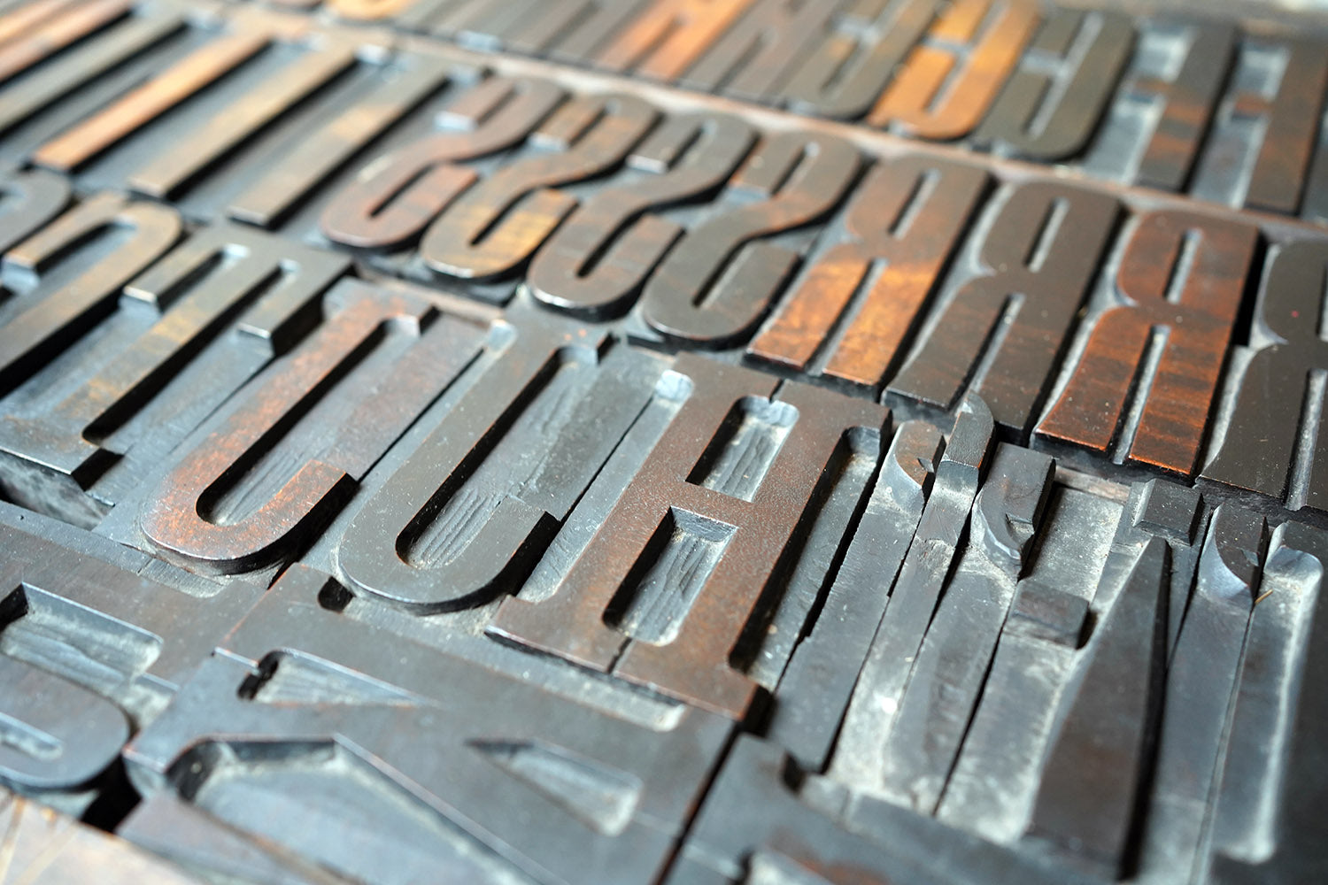 A 19thC Alphabet Tray of Wooden Letterpress Printing Blocks c.1895