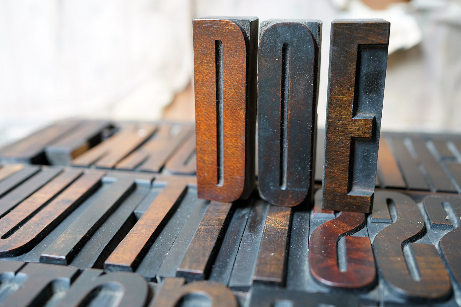 A 19thC Alphabet Tray of Wooden Letterpress Printing Blocks c.1895