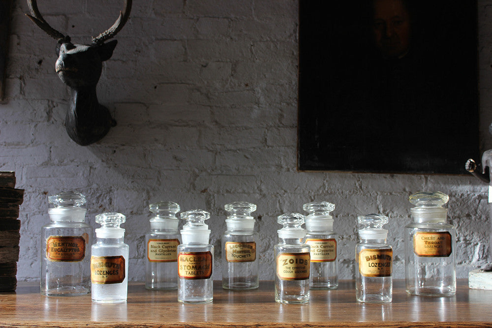 A Fantastic Group of Nine Early 20thC Clear Glass Chemist's Jars