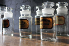 A Fantastic Group of Nine Early 20thC Clear Glass Chemist's Jars
