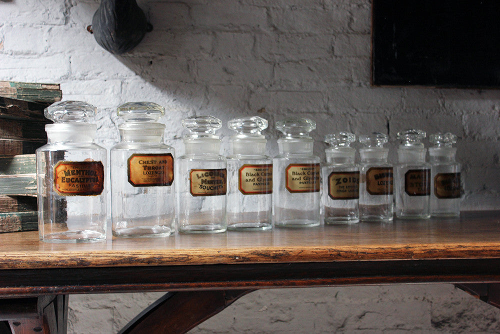 A Fantastic Group of Nine Early 20thC Clear Glass Chemist's Jars