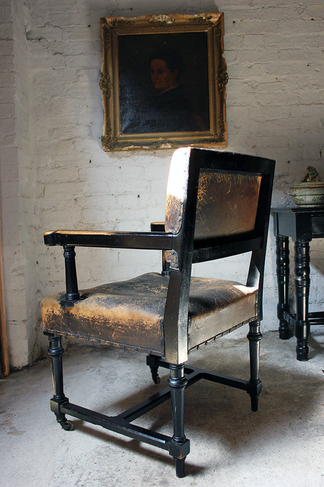 A Good Victorian Aesthetic Movement Ebonised & Leather Upholstered Armchair c.1880