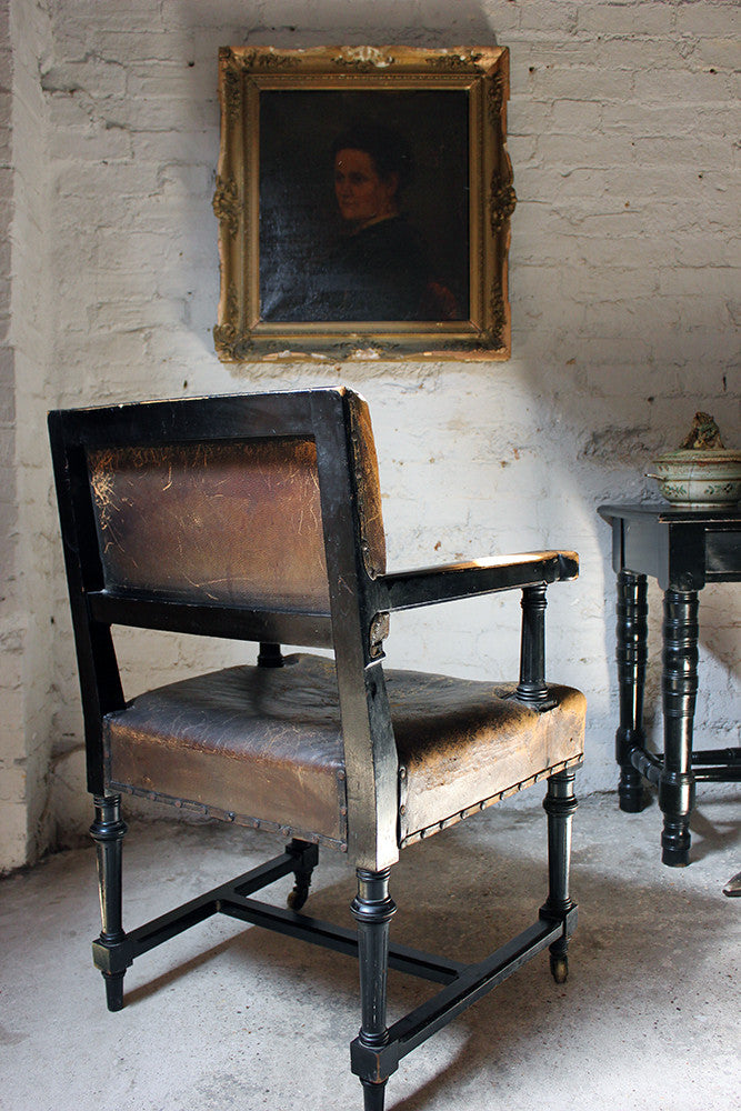 A Good Victorian Aesthetic Movement Ebonised & Leather Upholstered Armchair c.1880