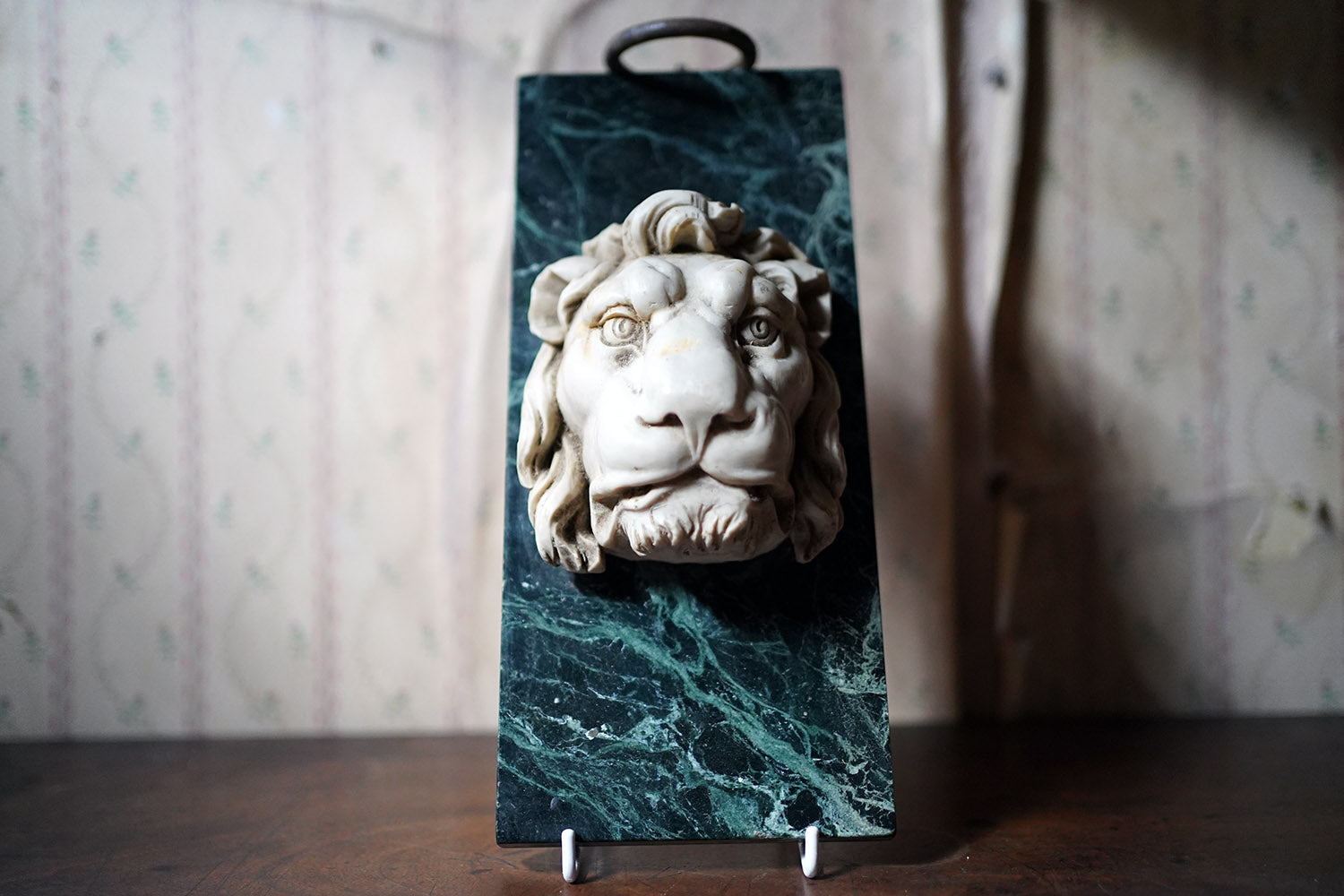 A 20thC Alabaster and Serpentine Marble Lion's Mask Wall Plaque