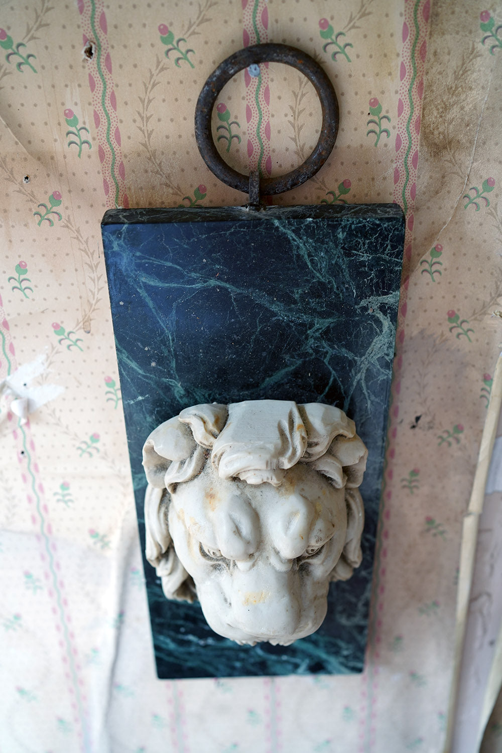 A 20thC Alabaster and Serpentine Marble Lion's Mask Wall Plaque