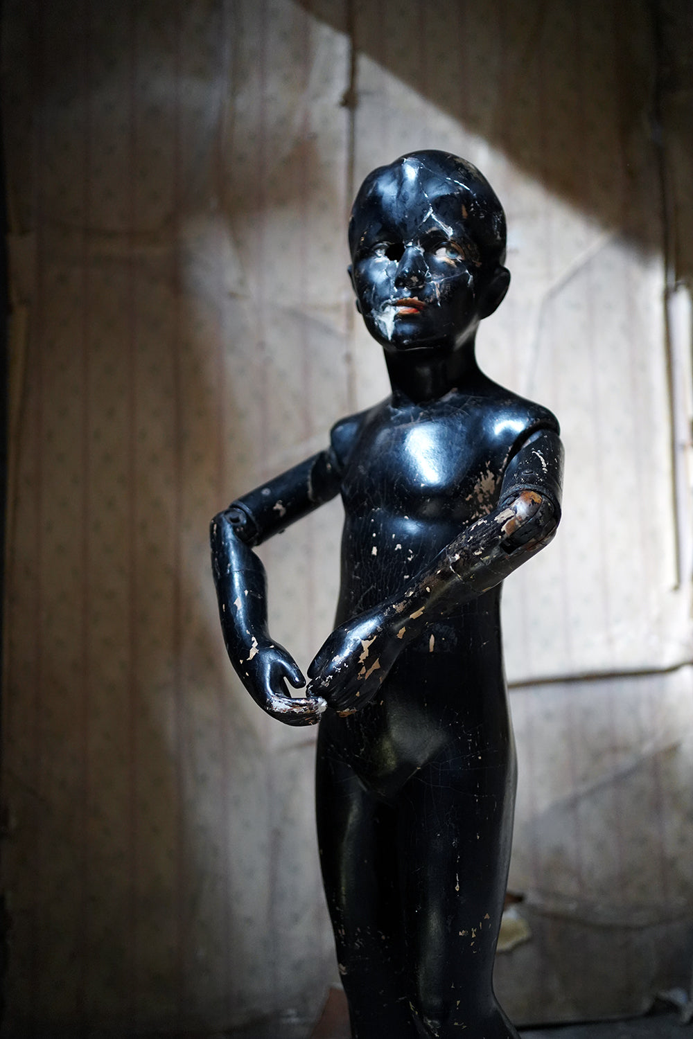A Black Painted Early 20thC Shop Display Youth Mannequin; c.1925-35