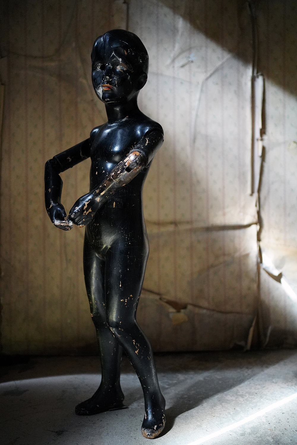 A Black Painted Early 20thC Shop Display Youth Mannequin; c.1925-35