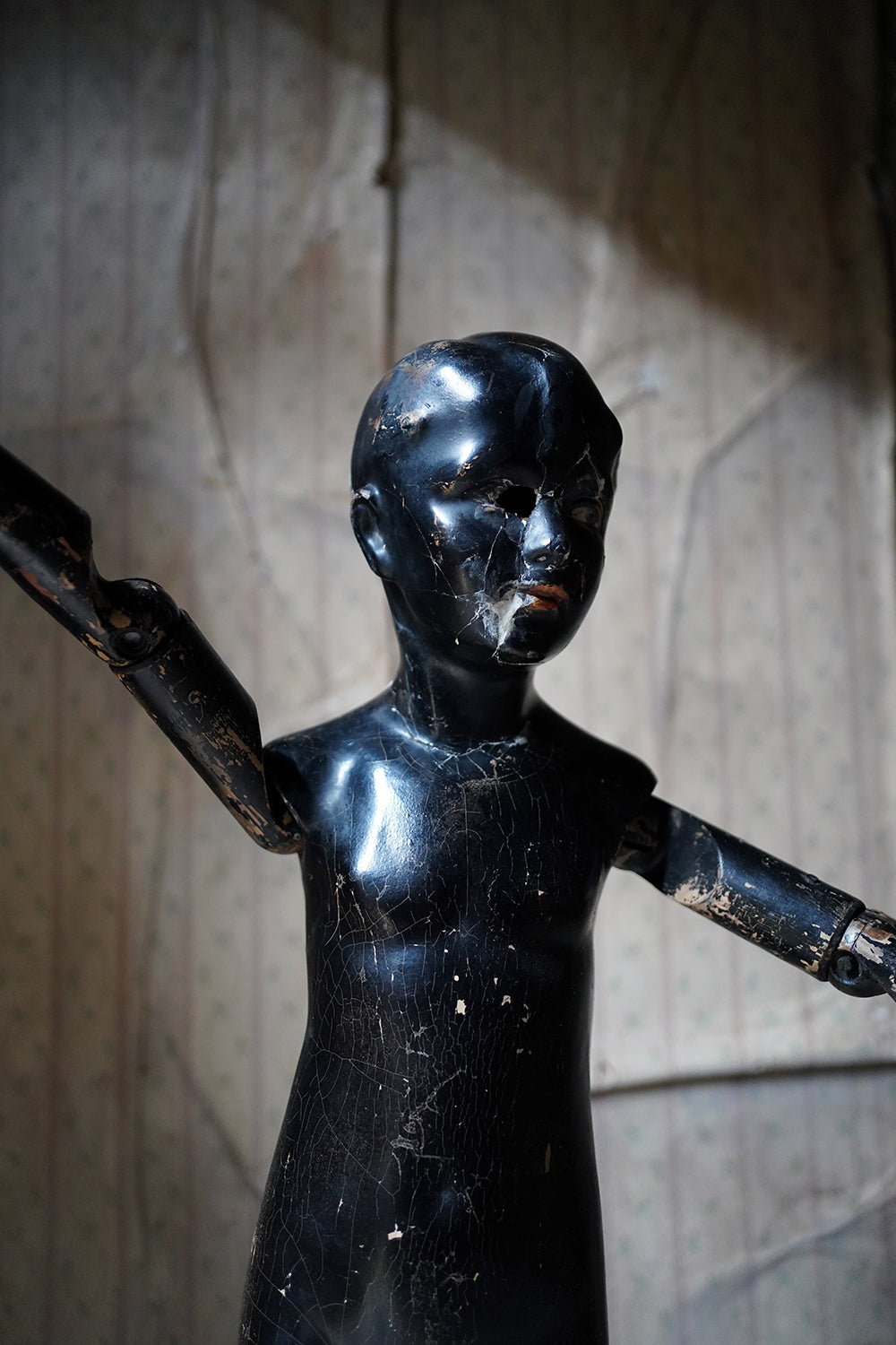 A Black Painted Early 20thC Shop Display Youth Mannequin; c.1925-35