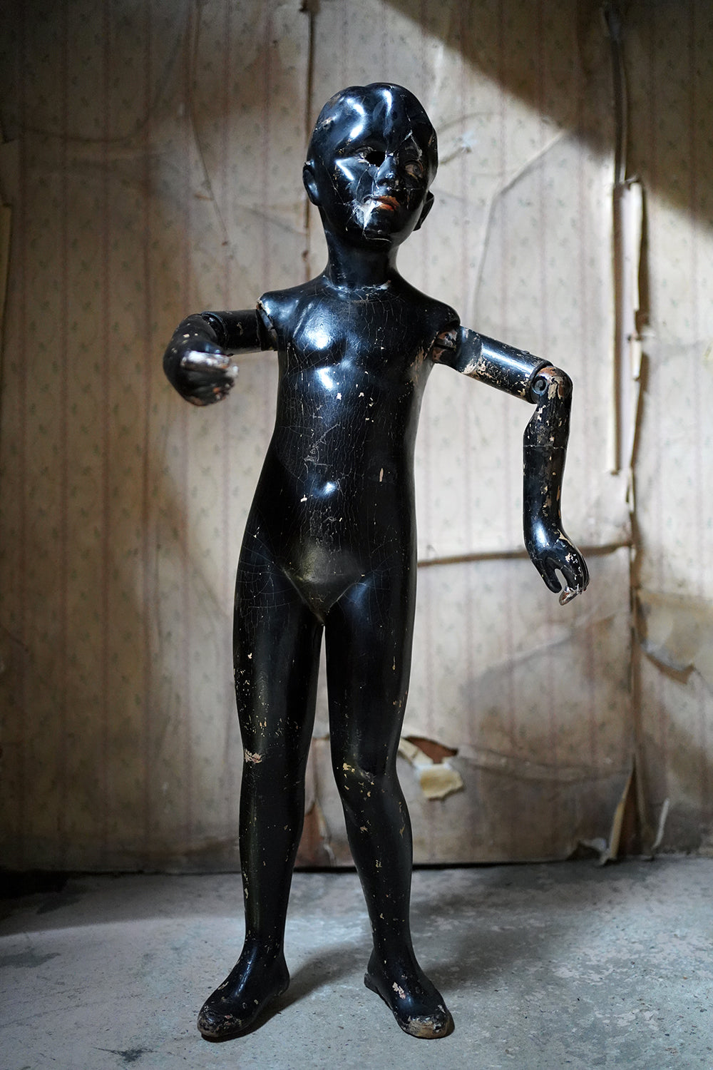 A Black Painted Early 20thC Shop Display Youth Mannequin; c.1925-35