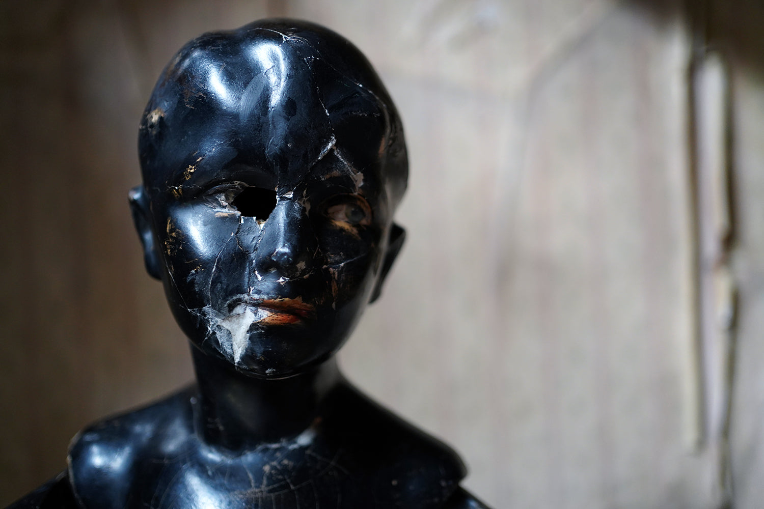 A Black Painted Early 20thC Shop Display Youth Mannequin; c.1925-35