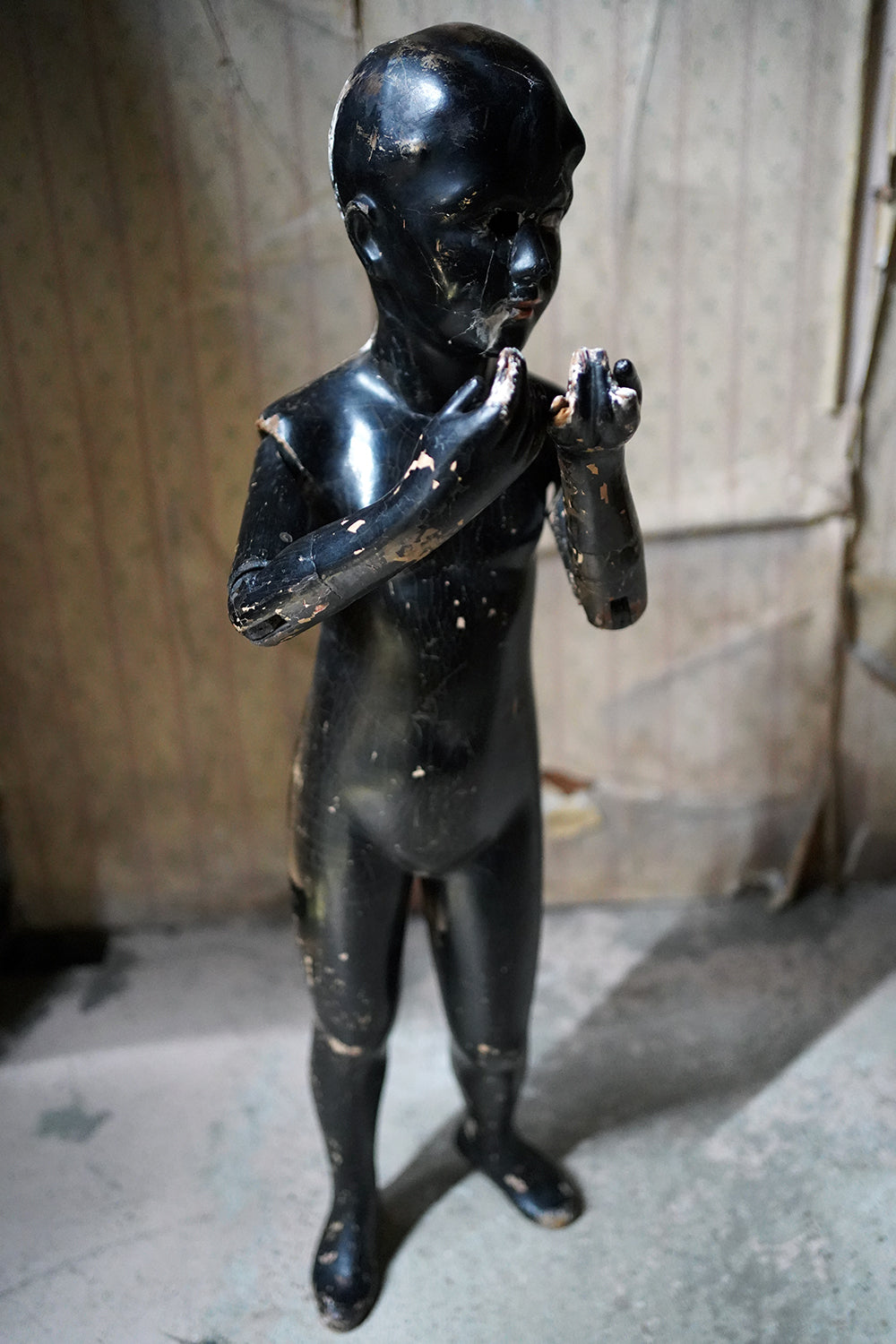 A Black Painted Early 20thC Shop Display Youth Mannequin; c.1925-35