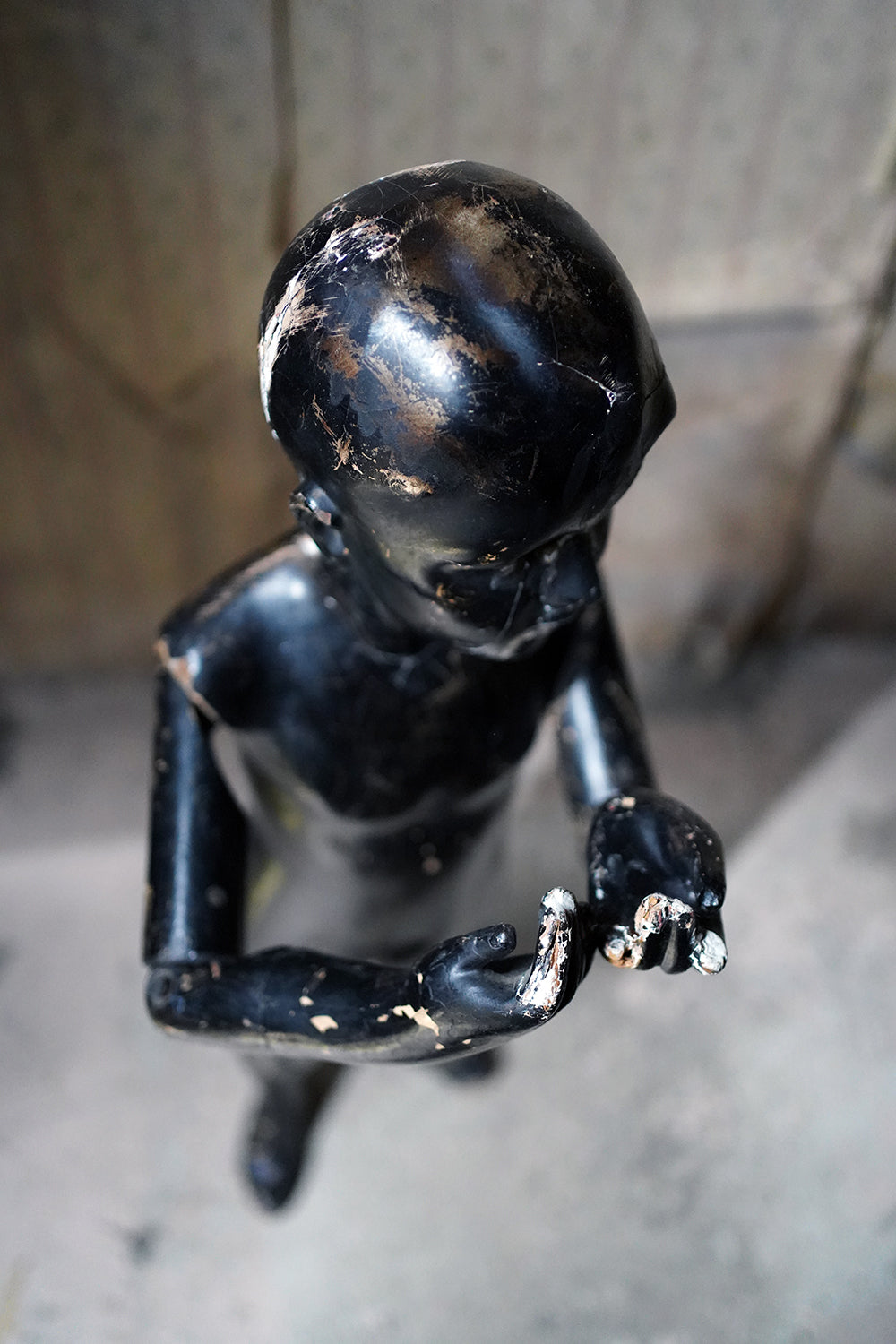 A Black Painted Early 20thC Shop Display Youth Mannequin; c.1925-35