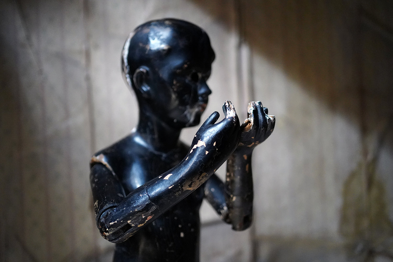 A Black Painted Early 20thC Shop Display Youth Mannequin; c.1925-35