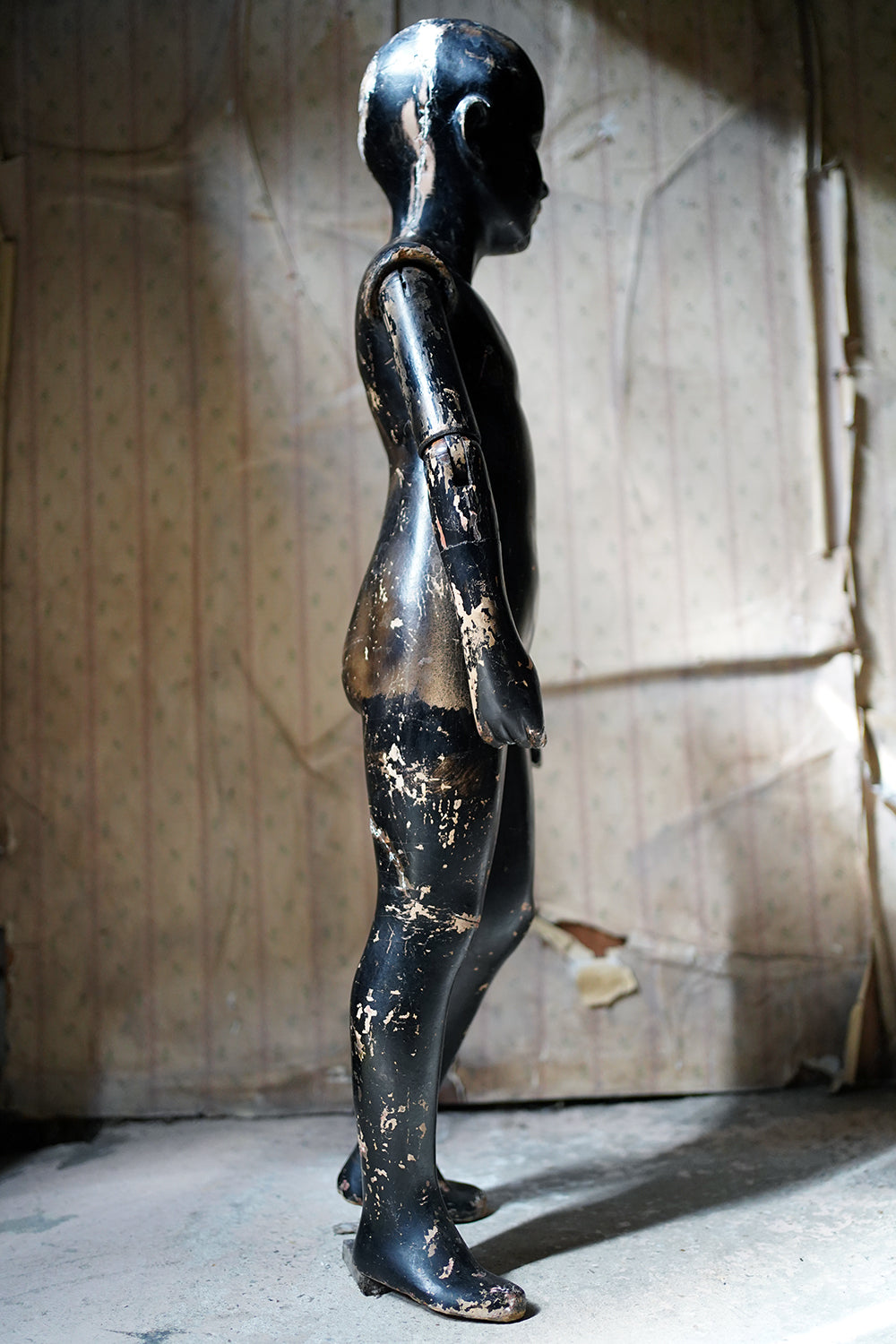A Black Painted Early 20thC Shop Display Youth Mannequin; c.1925-35