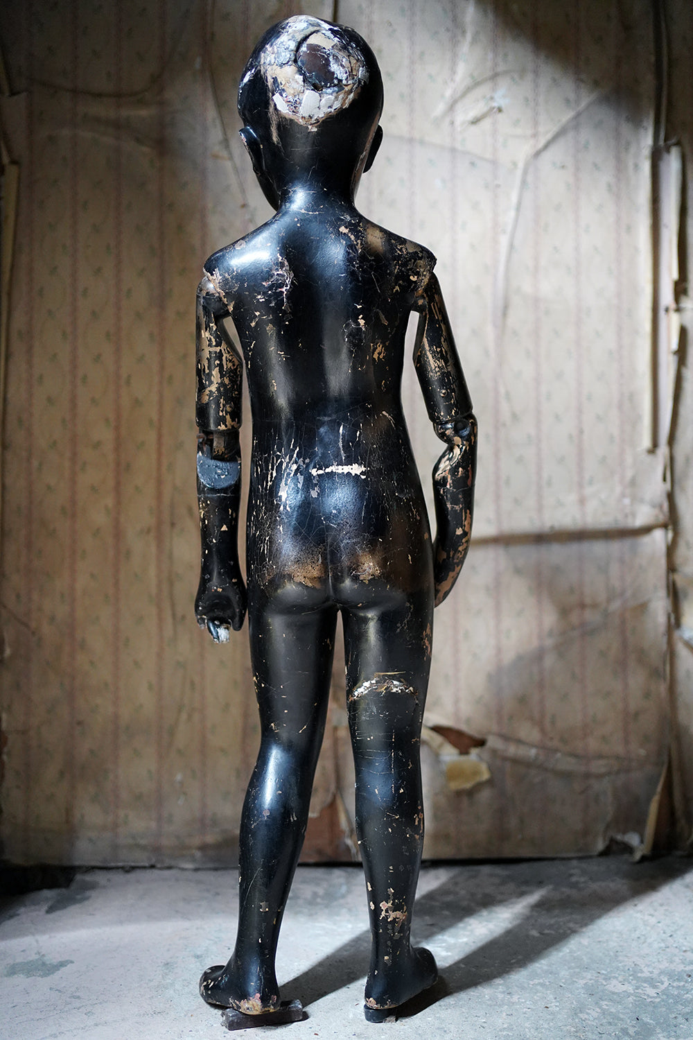A Black Painted Early 20thC Shop Display Youth Mannequin; c.1925-35