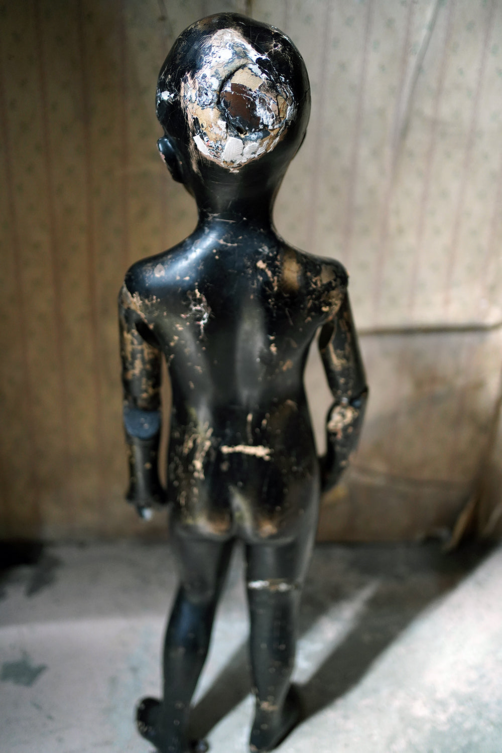 A Black Painted Early 20thC Shop Display Youth Mannequin; c.1925-35