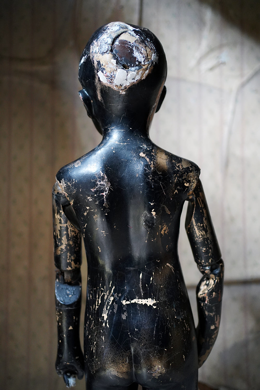 A Black Painted Early 20thC Shop Display Youth Mannequin; c.1925-35