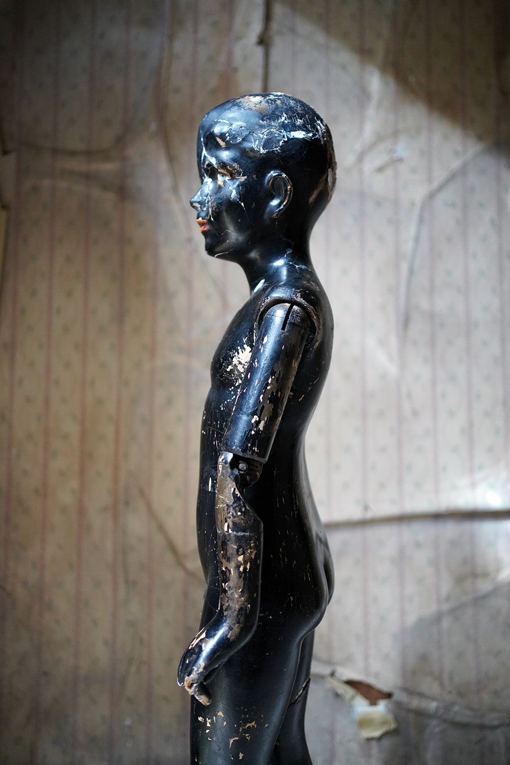 A Black Painted Early 20thC Shop Display Youth Mannequin; c.1925-35