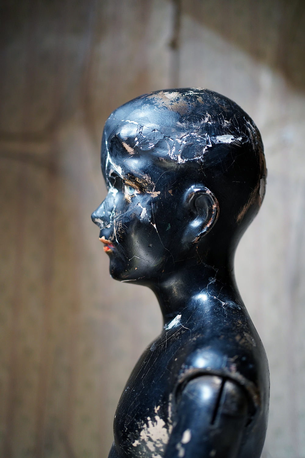 A Black Painted Early 20thC Shop Display Youth Mannequin; c.1925-35