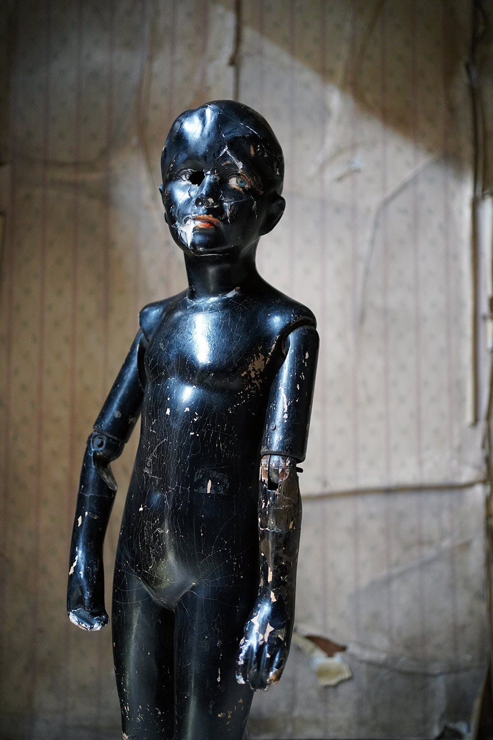 A Black Painted Early 20thC Shop Display Youth Mannequin; c.1925-35