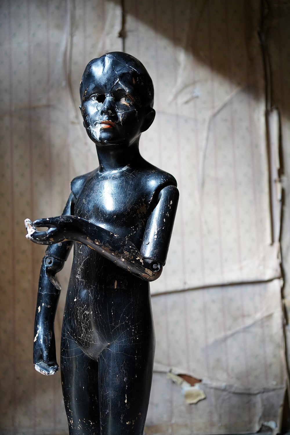 A Black Painted Early 20thC Shop Display Youth Mannequin; c.1925-35