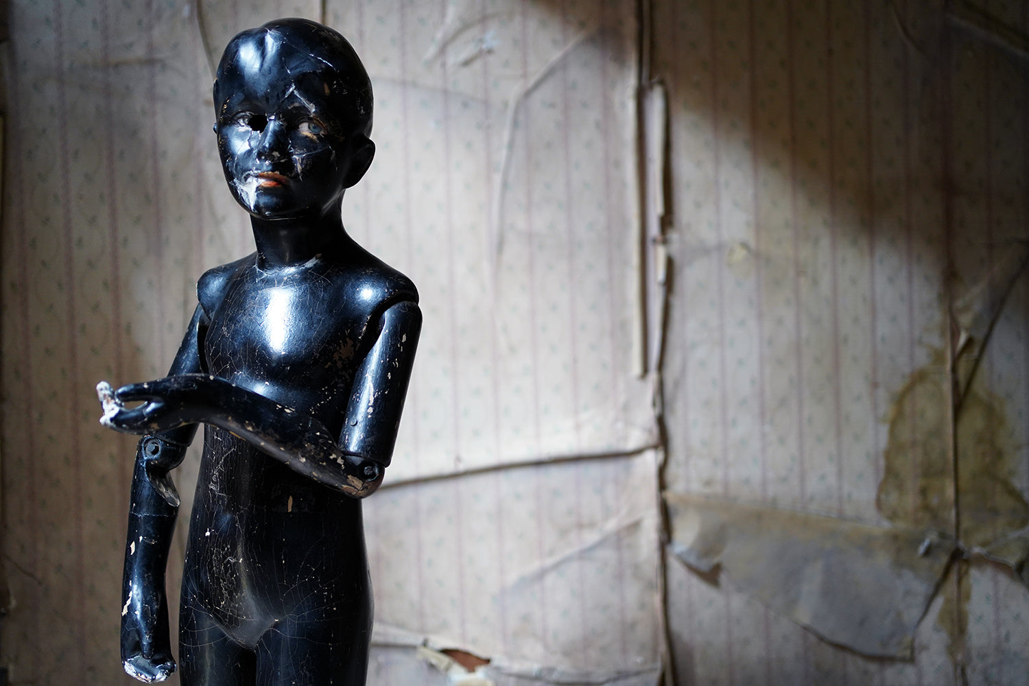 A Black Painted Early 20thC Shop Display Youth Mannequin; c.1925-35