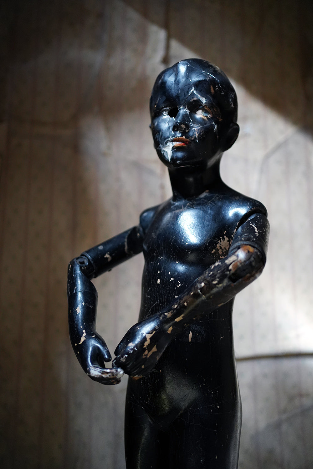 A Black Painted Early 20thC Shop Display Youth Mannequin; c.1925-35