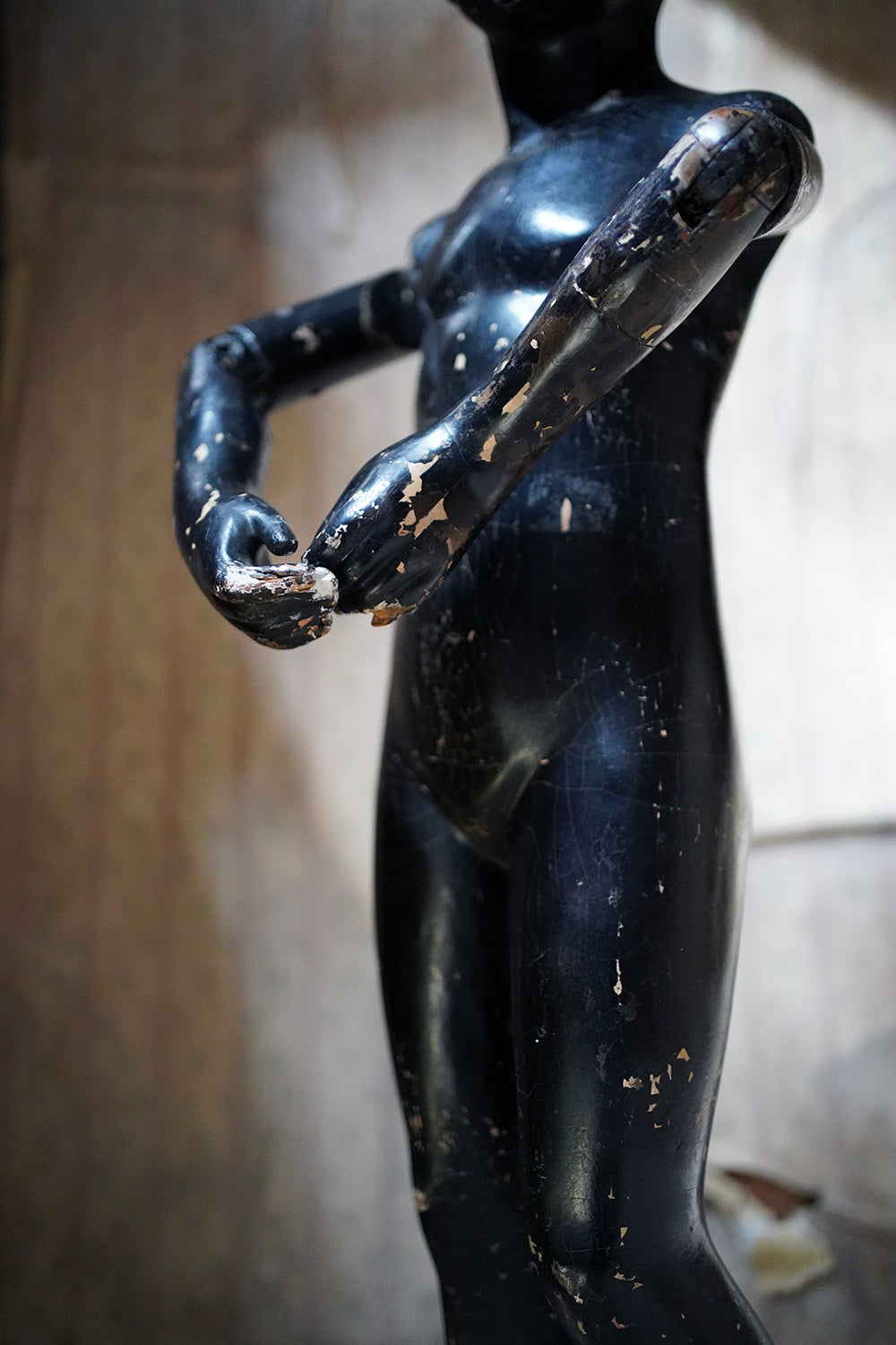 A Black Painted Early 20thC Shop Display Youth Mannequin; c.1925-35