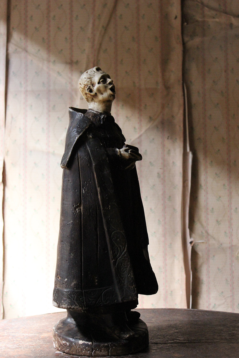 A 19thC Italian Painted Ceramic Figure of a Chanting Monk