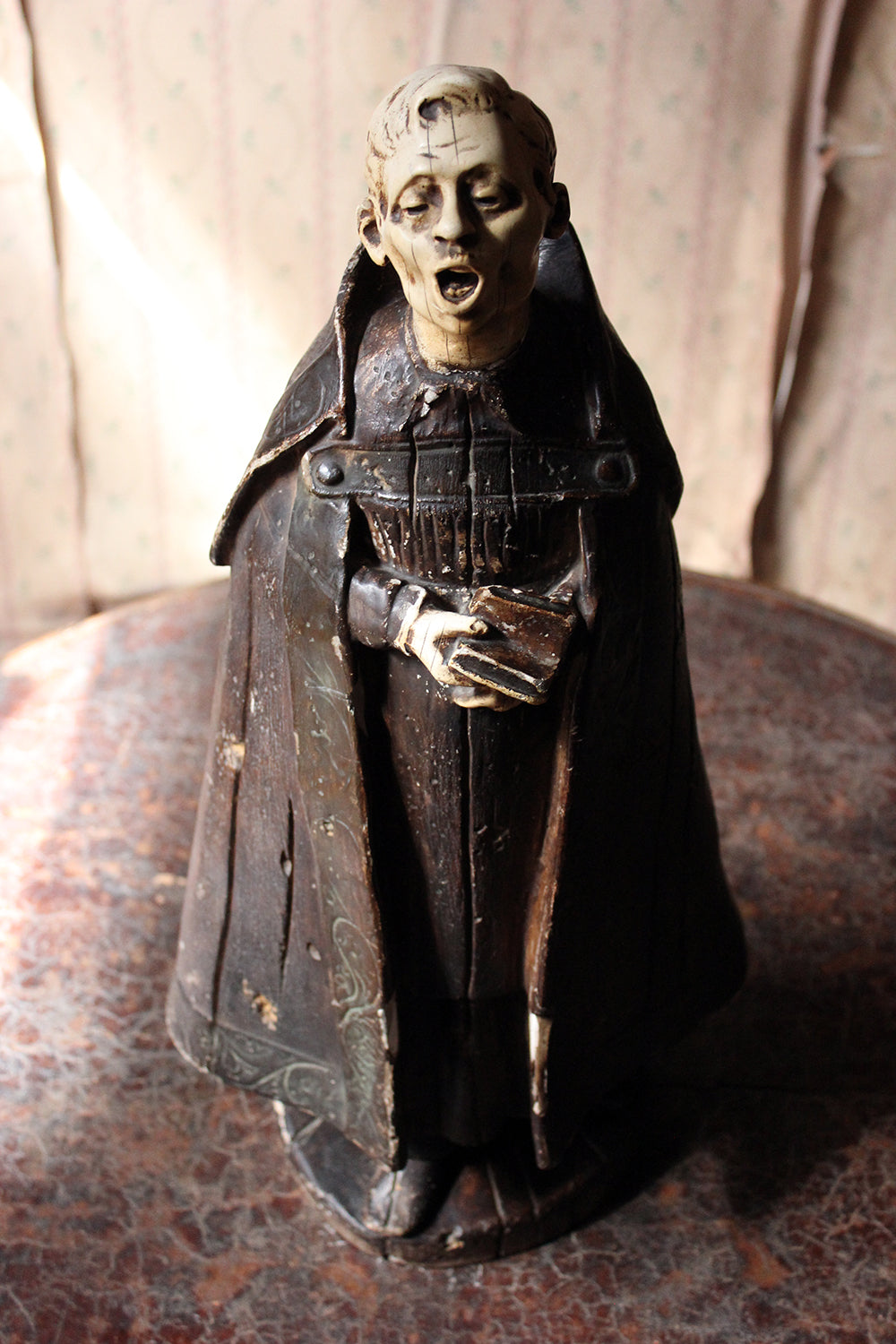 A 19thC Italian Painted Ceramic Figure of a Chanting Monk