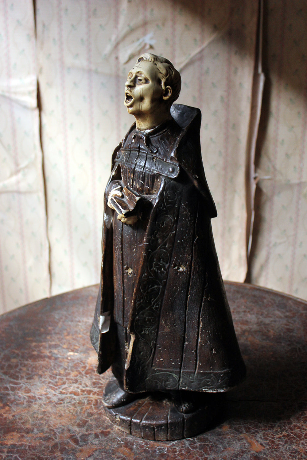 A 19thC Italian Painted Ceramic Figure of a Chanting Monk