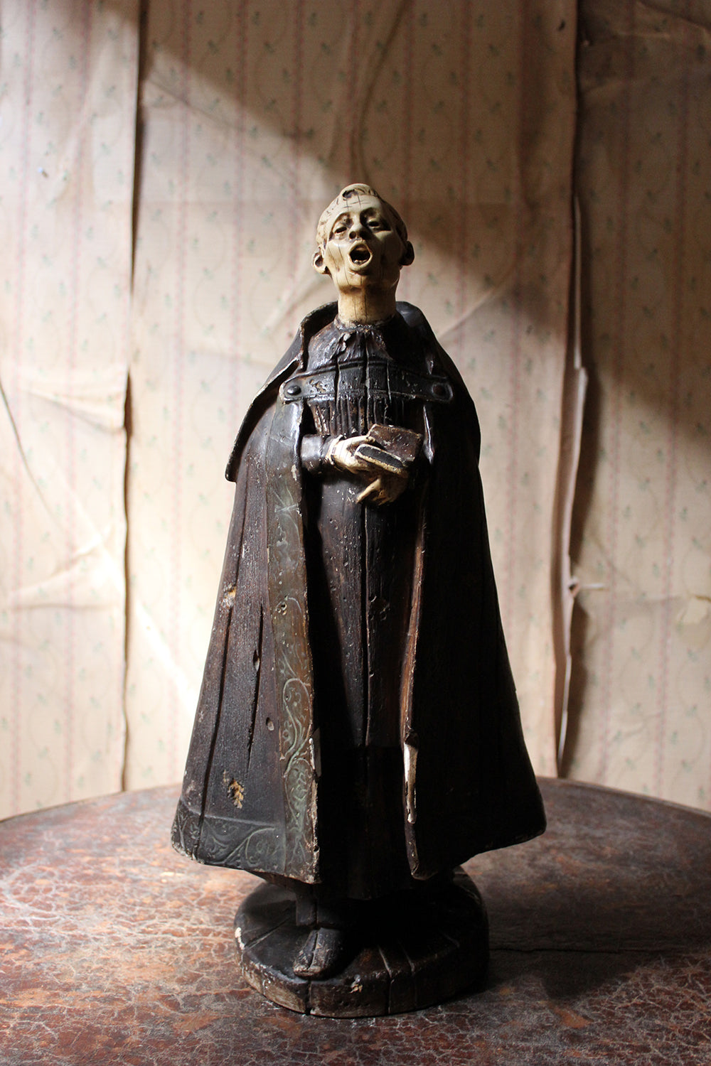 A 19thC Italian Painted Ceramic Figure of a Chanting Monk
