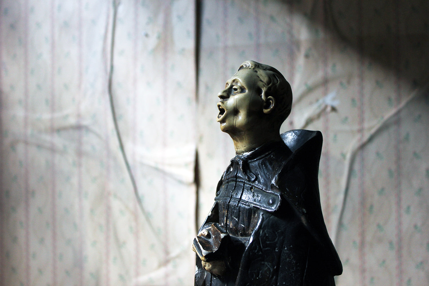 A 19thC Italian Painted Ceramic Figure of a Chanting Monk
