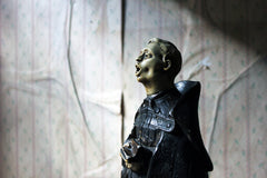 A 19thC Italian Painted Ceramic Figure of a Chanting Monk