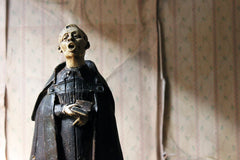 A 19thC Italian Painted Ceramic Figure of a Chanting Monk