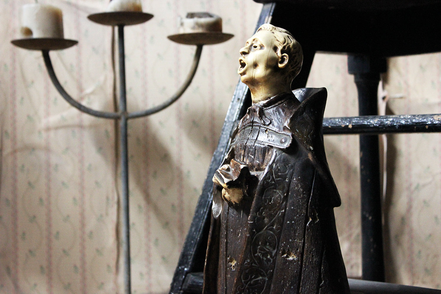 A 19thC Italian Painted Ceramic Figure of a Chanting Monk