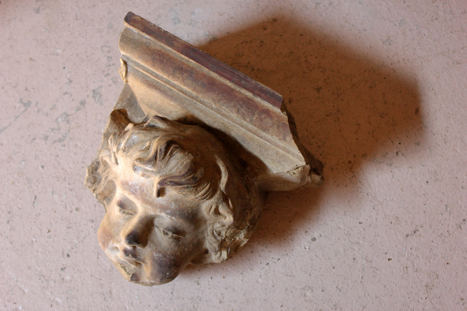 A 19thC Ecclesiastical Sculpted Stoneware Cherub Corbel Bracket c.1870