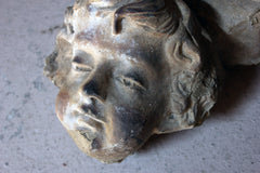 A 19thC Ecclesiastical Sculpted Stoneware Cherub Corbel Bracket c.1870