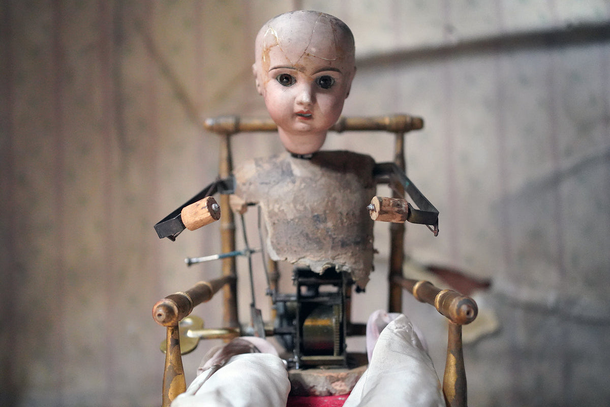 A French Bisque Musical Automaton by Roullet et Decamps; 'Bebe Tricoteur' c.1885-90