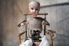 A French Bisque Musical Automaton by Roullet et Decamps; 'Bebe Tricoteur' c.1885-90
