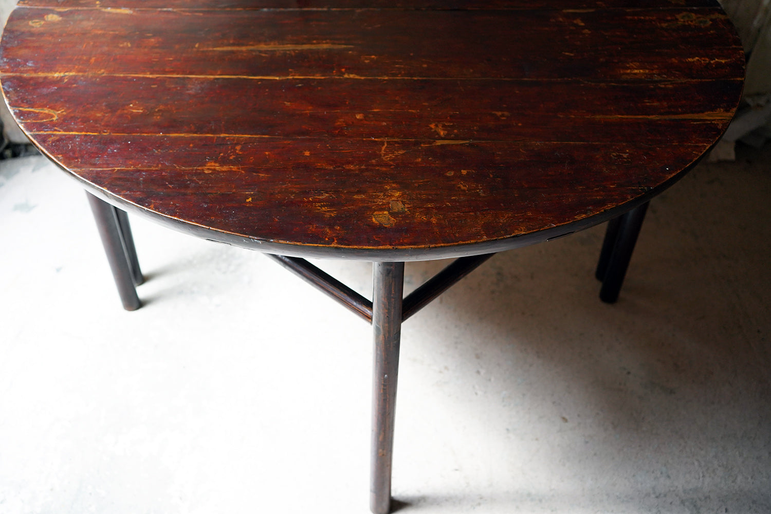 A 19thC Chinese Lacquered Circular Dining Table